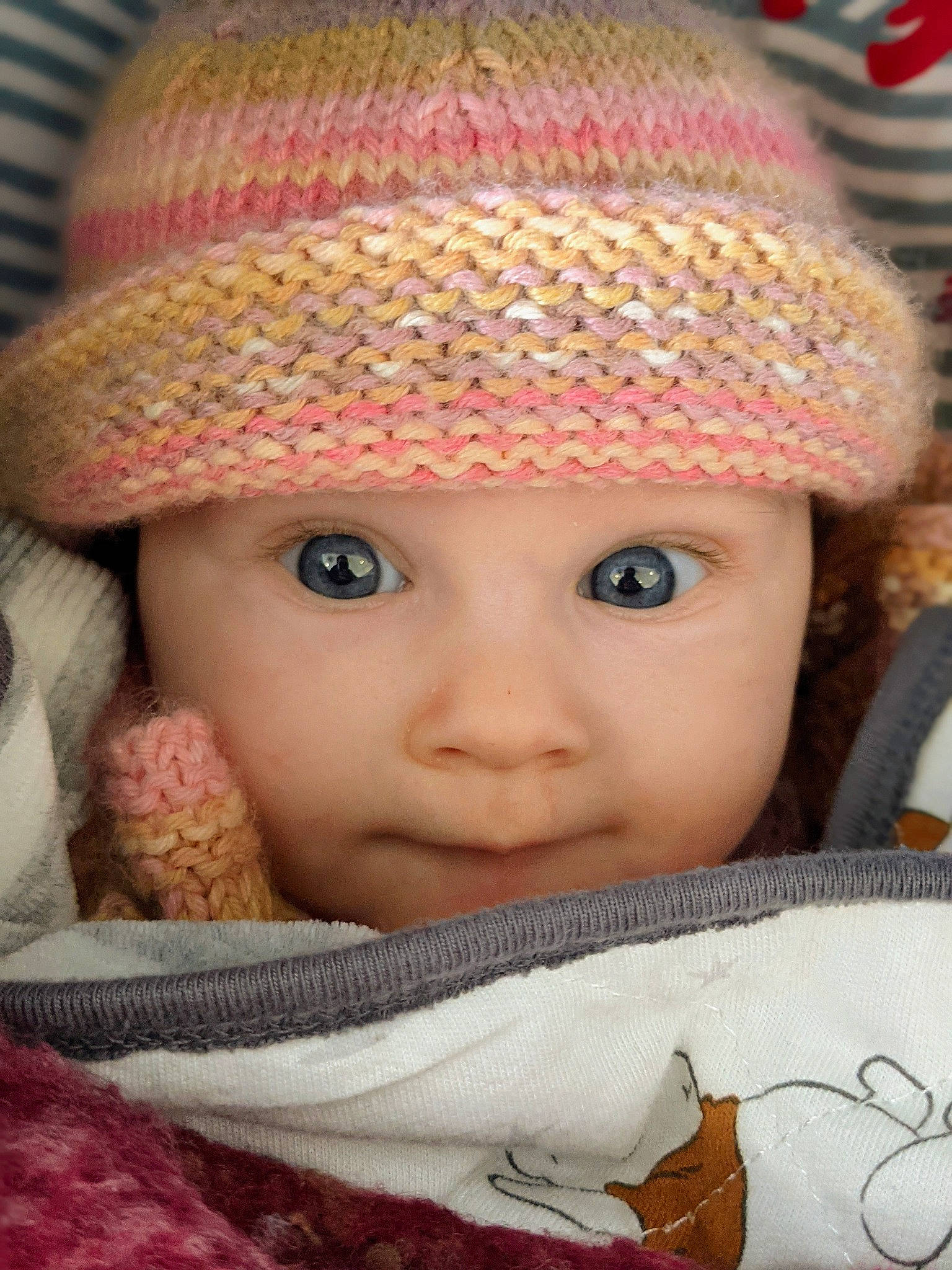 Célestine participe au concours pour gagner de l'argent avec cette photo : baby, cap, cheek, chin, eye, eyelash, fashion, hat, head, headgear, headwear, human, iris, lip, nose, organ, outerwear, person, pink, skin
