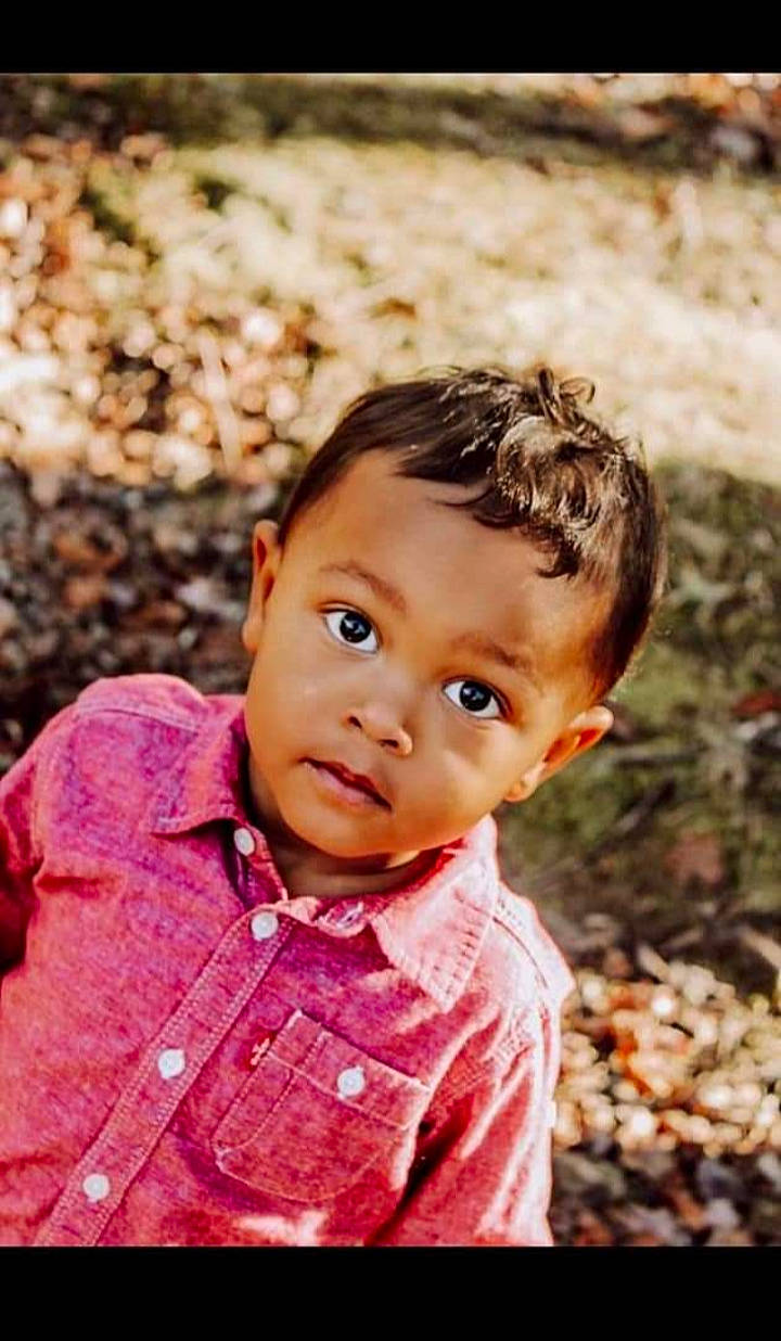 Amarii is registered to the contest to win money with this photo: cheek, child, eye, flash_photography, forehead, fun, grass, happy, lip, nose, people_in_nature, person, plant, portrait, portrait_photography, sitting, skin, soil, toddler, tree