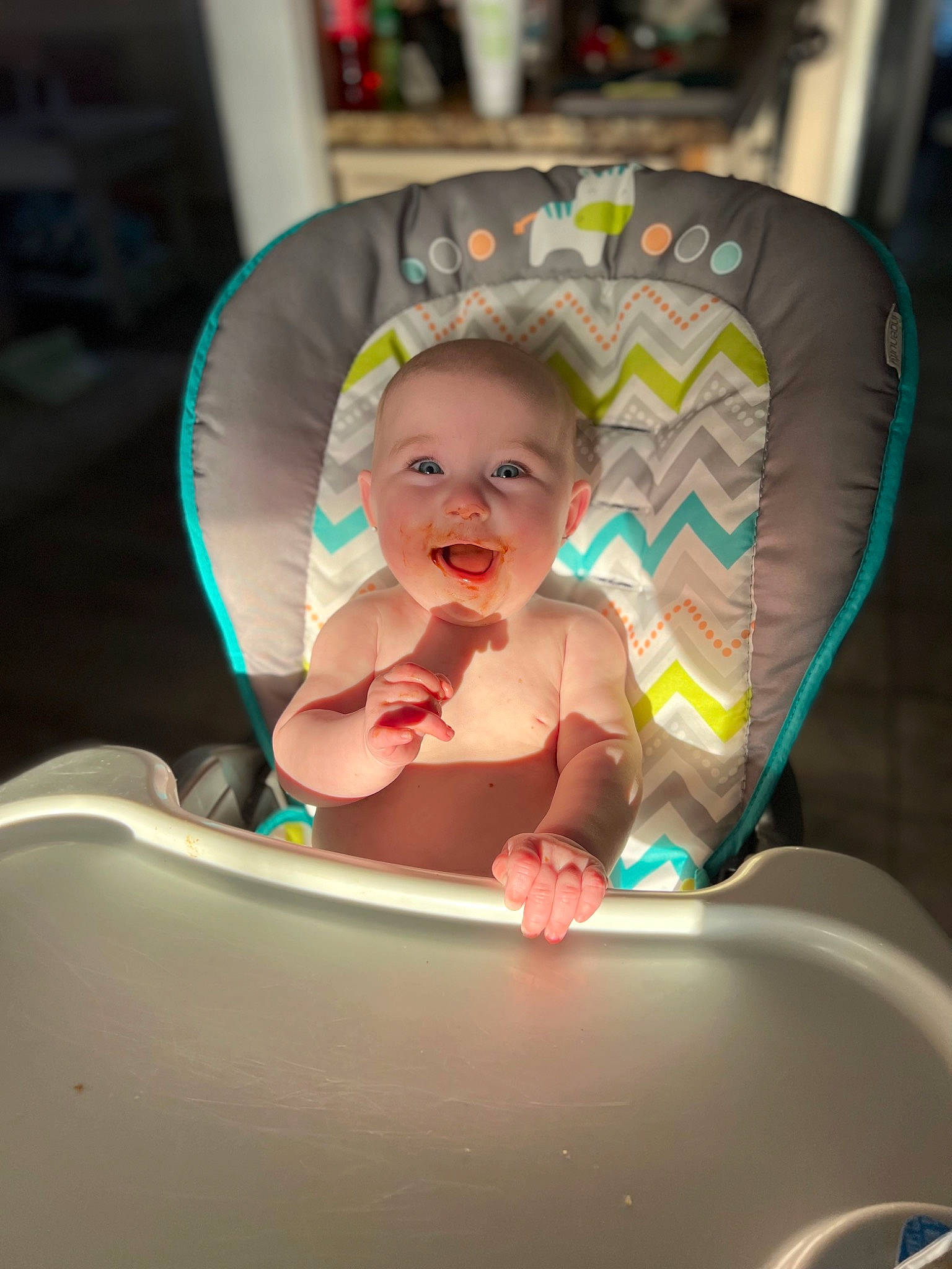 Stevie is registered to the contest to win money with this photo: baby, baby_products, baby_toddler_clothing, bathing, car_seat, child, comfort, eye, fun, happy, human_body, leg, magenta, mouth, person, plastic, sitting, smile, thigh, thumb