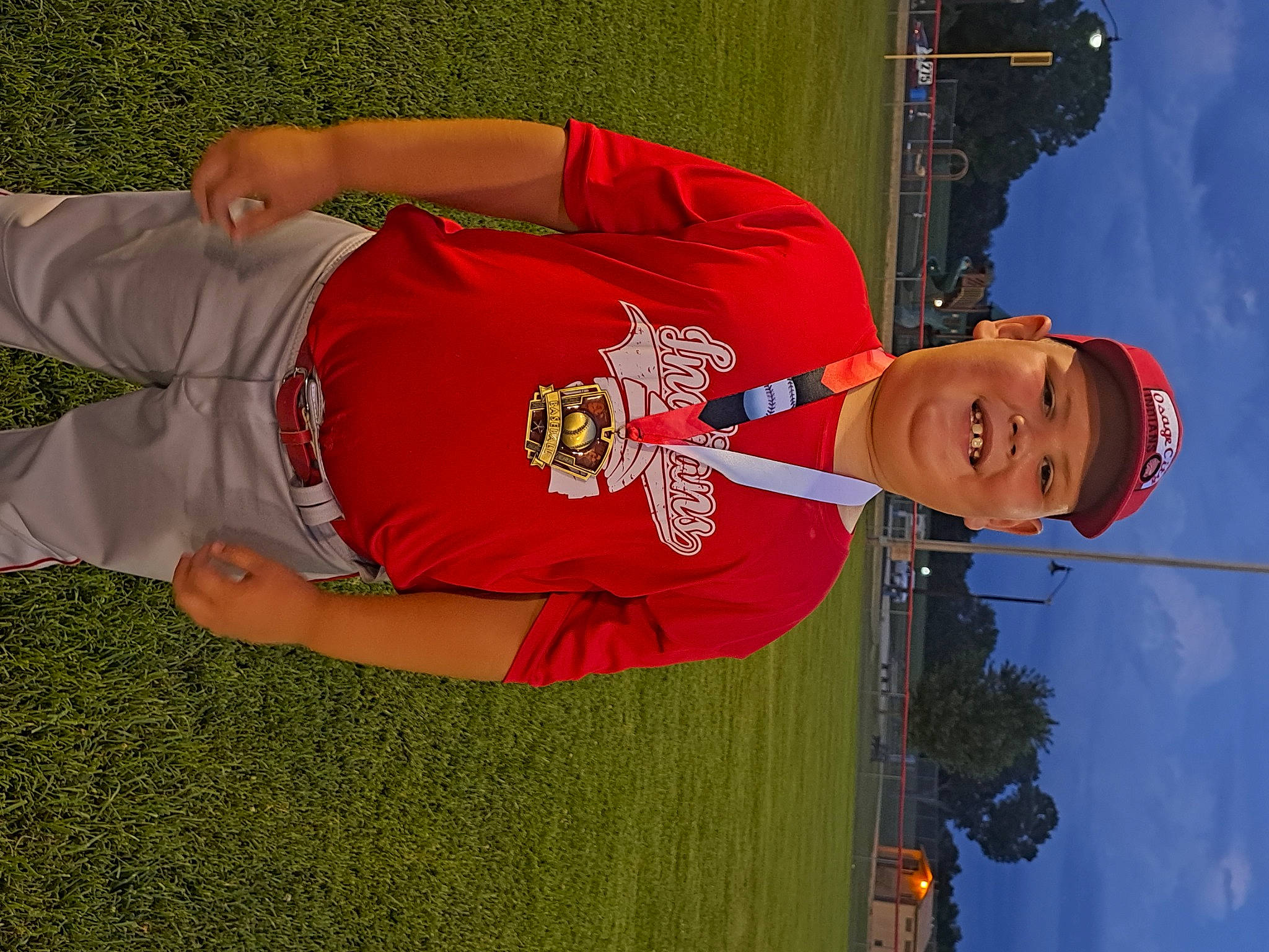 Aiden joined the competition — help win amazing prizes! baseball, competition, competition_event, elbow, fun, gesture, grass, happy, hat, headwear, jersey, joy, leisure, person, player, recreation, sky, sports, sports_uniform, sportswear