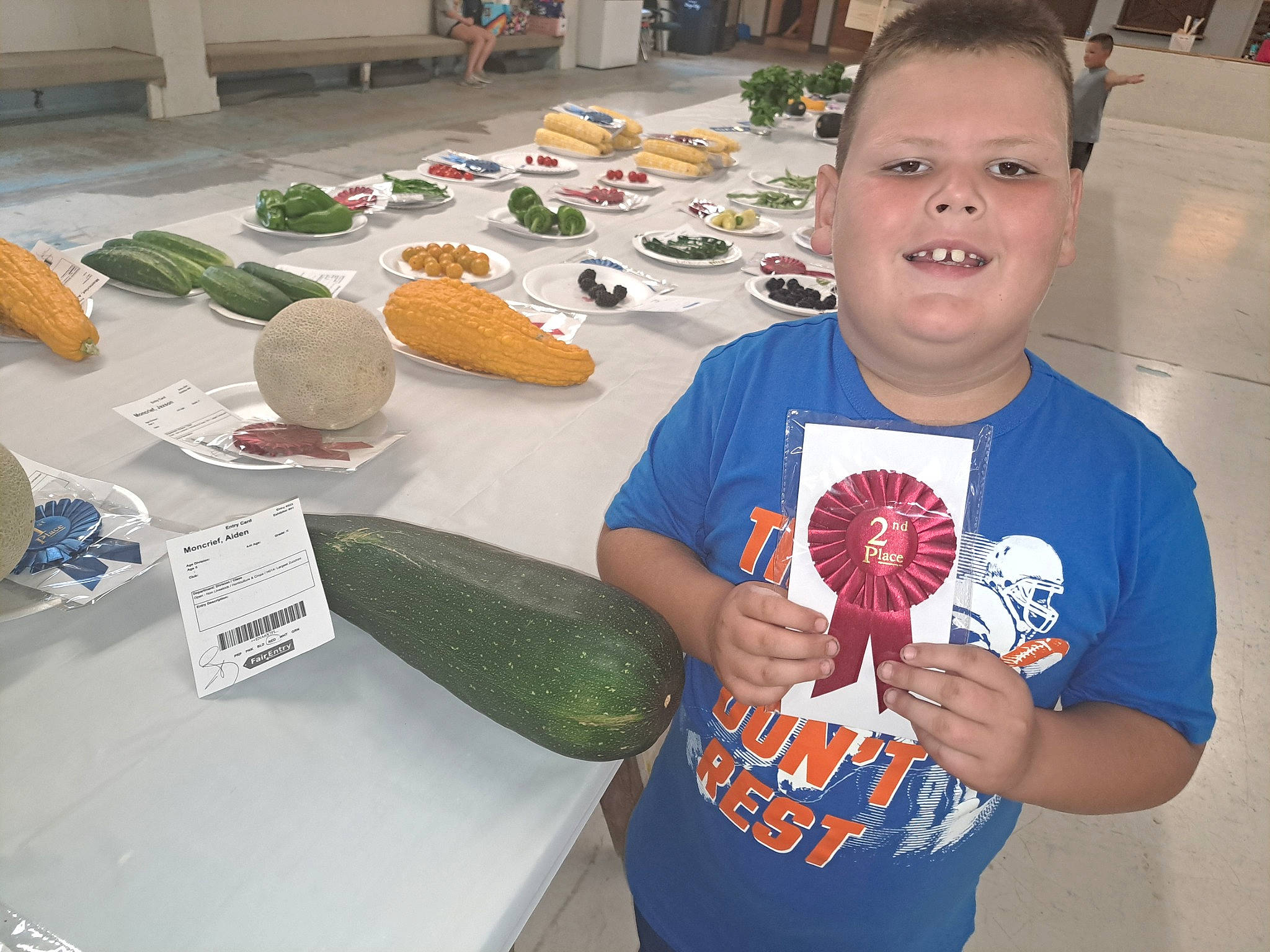 Aiden joined the competition — help win amazing prizes! citrullus, cooking, cuisine, dish, event, food, food_group, fruit, ingredient, joy, local_food, melon, natural_foods, person, produce, sharing, superfood, t_shirt, table, vegetable