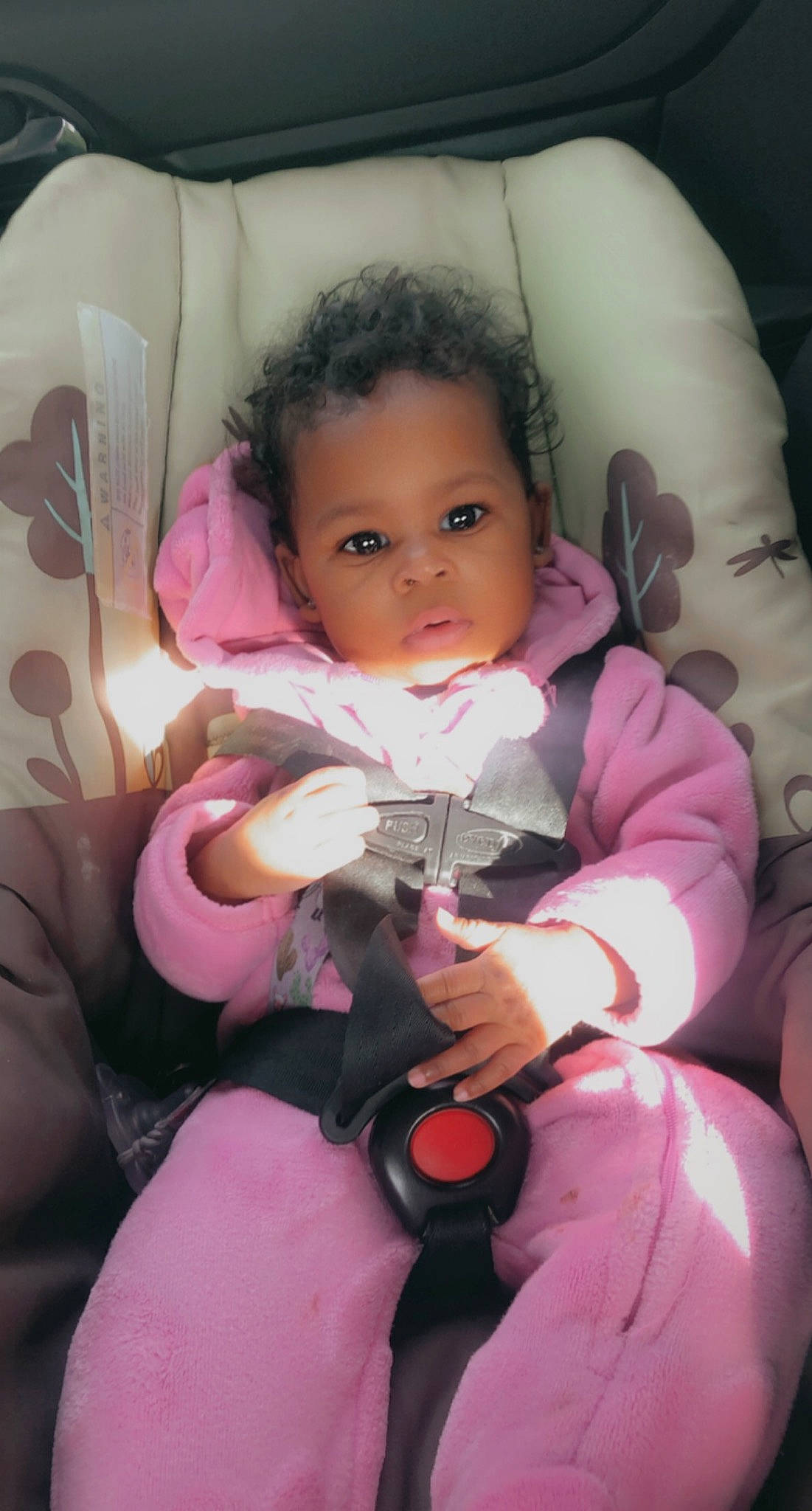 Kahlia joined the competition — help win amazing prizes! arm, baby_carriage, baby_toddler_clothing, chair, cheek, comfort, eye, face, facial_expression, head, human, human_body, iris, lap, leg, lip, mammal, mouth, person, purple