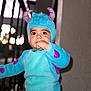 toddler, child, costume, blue, purple, monster, cute, fuzzy, outdoor, curious, hand, face, eyes, baby, portrait, clothing, hat, funny, standing, evening