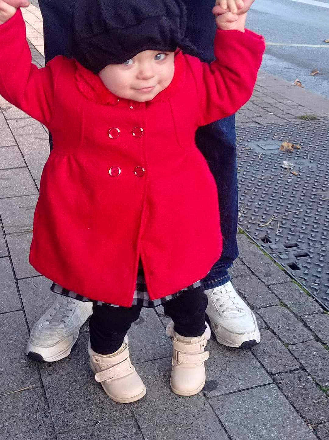 Andrea participe au concours pour gagner de l'argent avec cette photo : baby, boot, cool, face, footwear, fun, gesture, happy, headwear, leg, magenta, person, photograph, pink, purple, shoe, sleeve, smile, sneakers, toddler