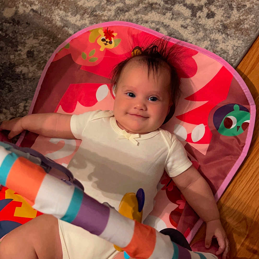 Keziah joined the competition — help win amazing prizes! baby, bed, clothing, couch, crib, cushion, face, footwear, furniture, glove, head, homedecor, infantbed, person, photography, portrait, shoe, shorts, sneaker, t_shirt