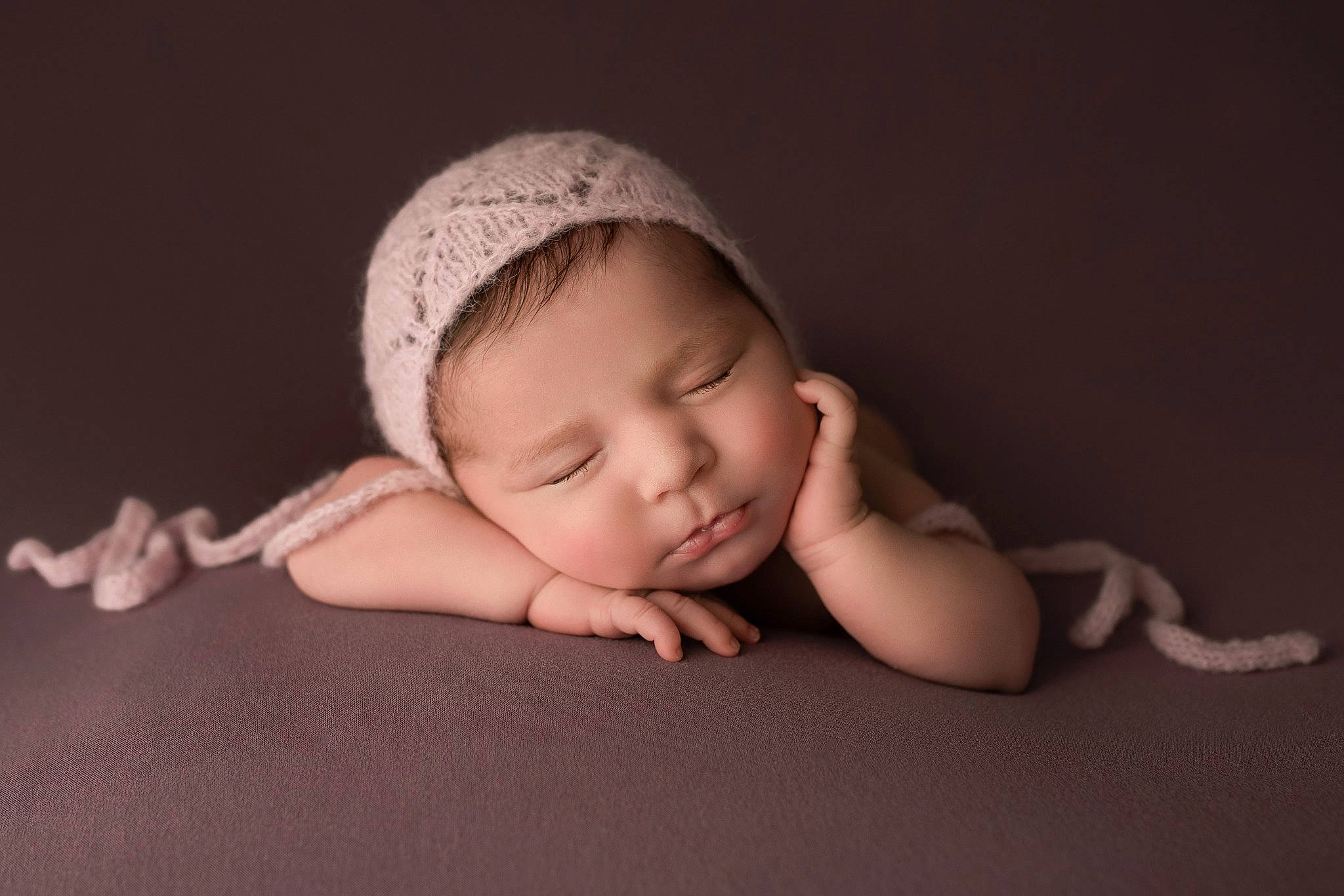Margaux participe au concours pour gagner de l'argent avec cette photo : baby, baby_toddler_clothing, cap, cheek, child, comfort, darkness, flash_photography, flooring, grass, iris, knit_cap, linens, monochrome_photography, pattern, person, portrait_photography, sitting, skin, toddler
