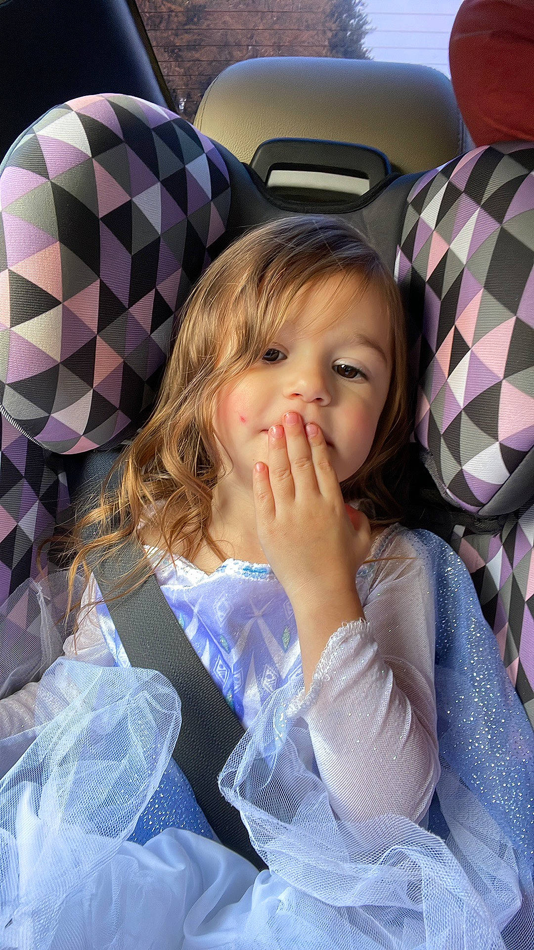 Arya joined the competition — help win amazing prizes! blond, brown_hair, car_seat, child, comfort, cool, eyelash, facial_expression, fun, hairstyle, happy, human, iris, lip, long_hair, pattern, person, sitting, skin, tints_and_shades