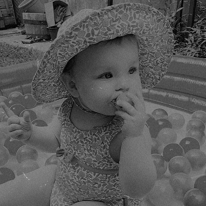 Estelle is registered to the contest to win money with this photo: baby, bathing, bathtub, bodypart, bonnet, cap, clothing, face, finger, hand, hat, head, person, photography, pool, portrait, sitting, sunhat, tub, water