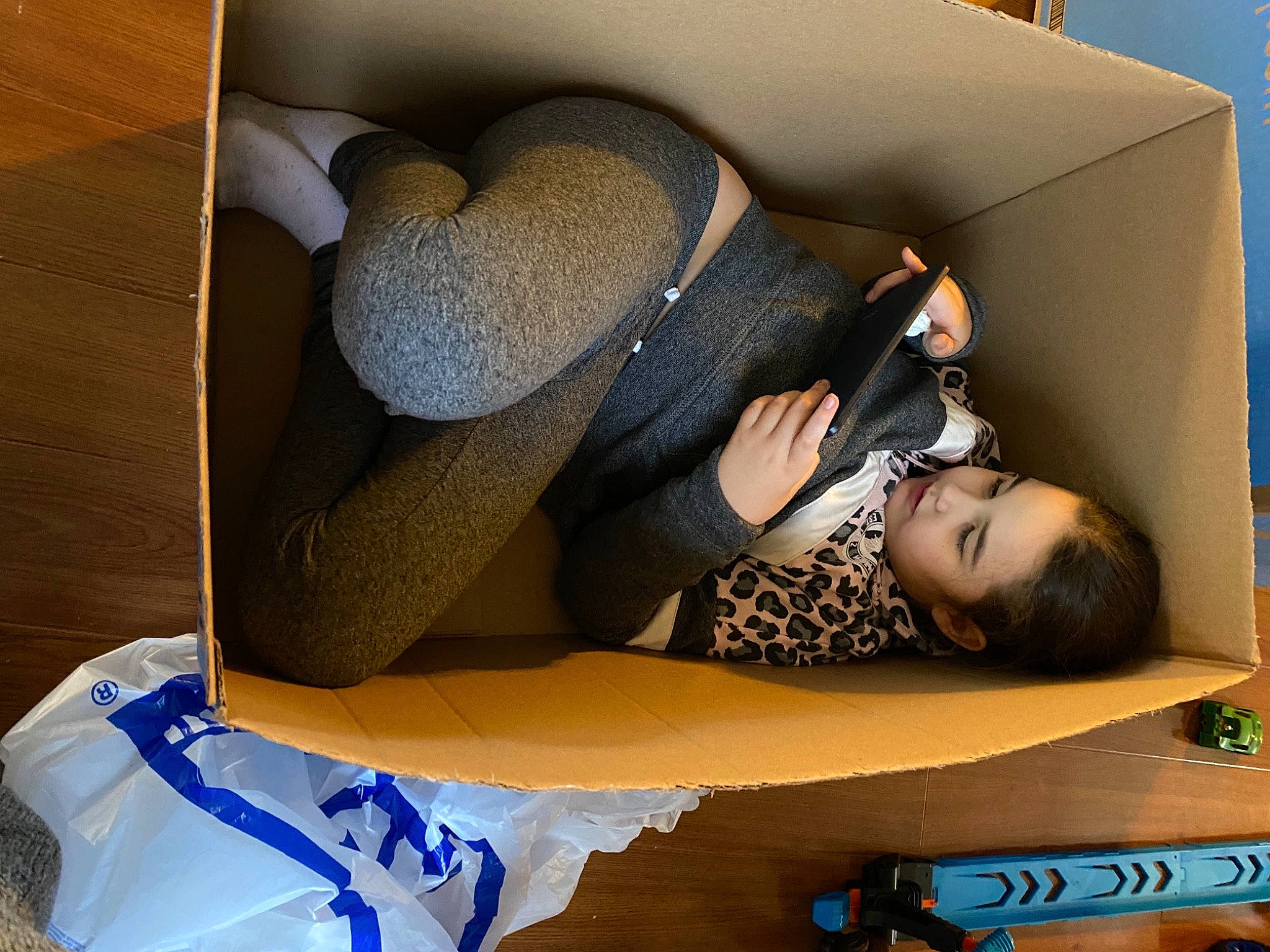 Kyra joined the competition — help win amazing prizes! child, comfort, elbow, eyewear, fashion_accessory, fashion_design, flooring, fun, hairstyle, hat, headgear, human_leg, knee, leg, leisure, person, room, sitting, sun_hat, thigh