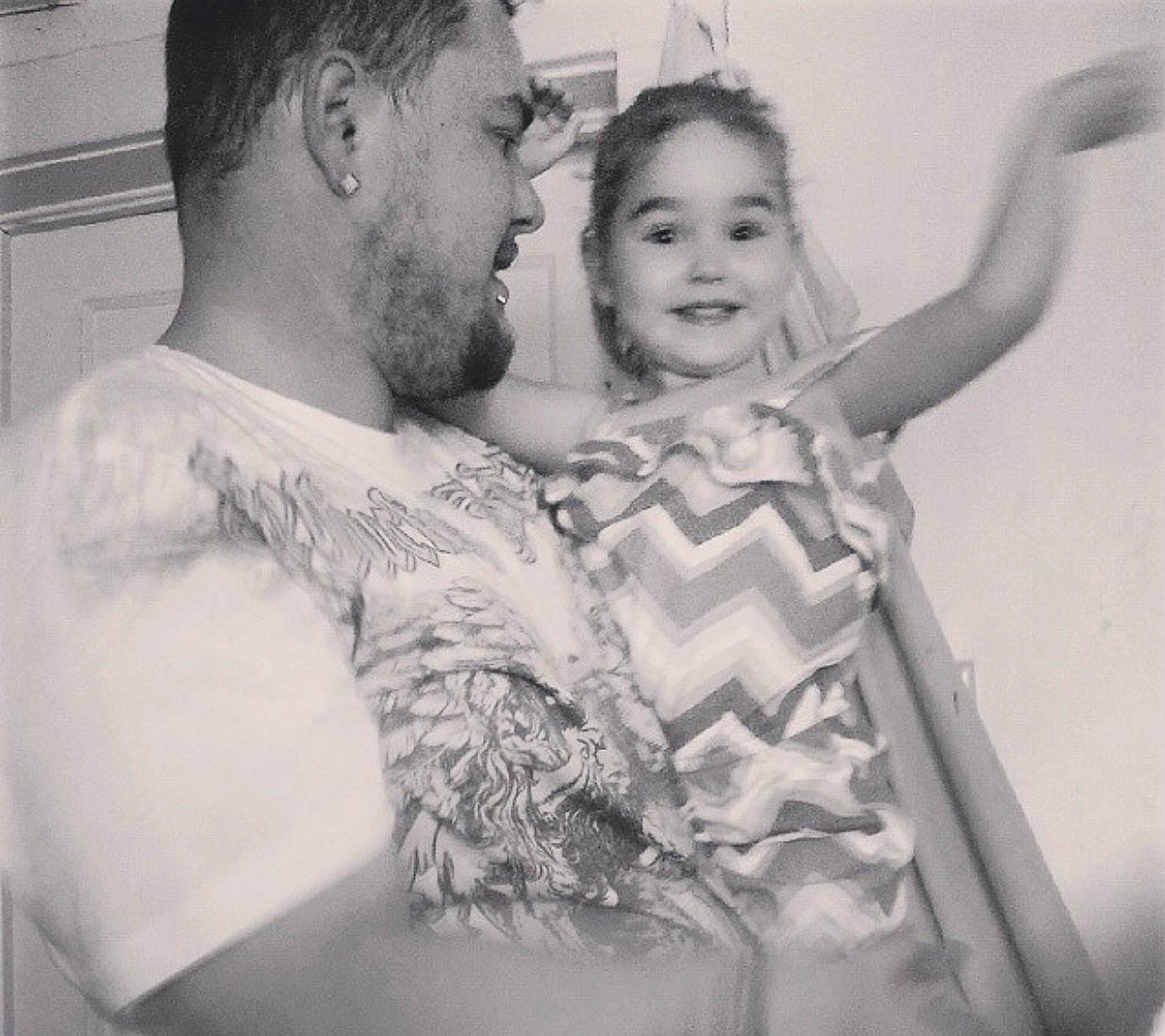 Kyra is registered to the contest to win money with this photo: arm, beard, black, black_and_white, chest, flash_photography, gesture, hair, happy, head, human_body, iris, joy, monochrome, monochrome_photography, neck, organ, person, shoulder, smile