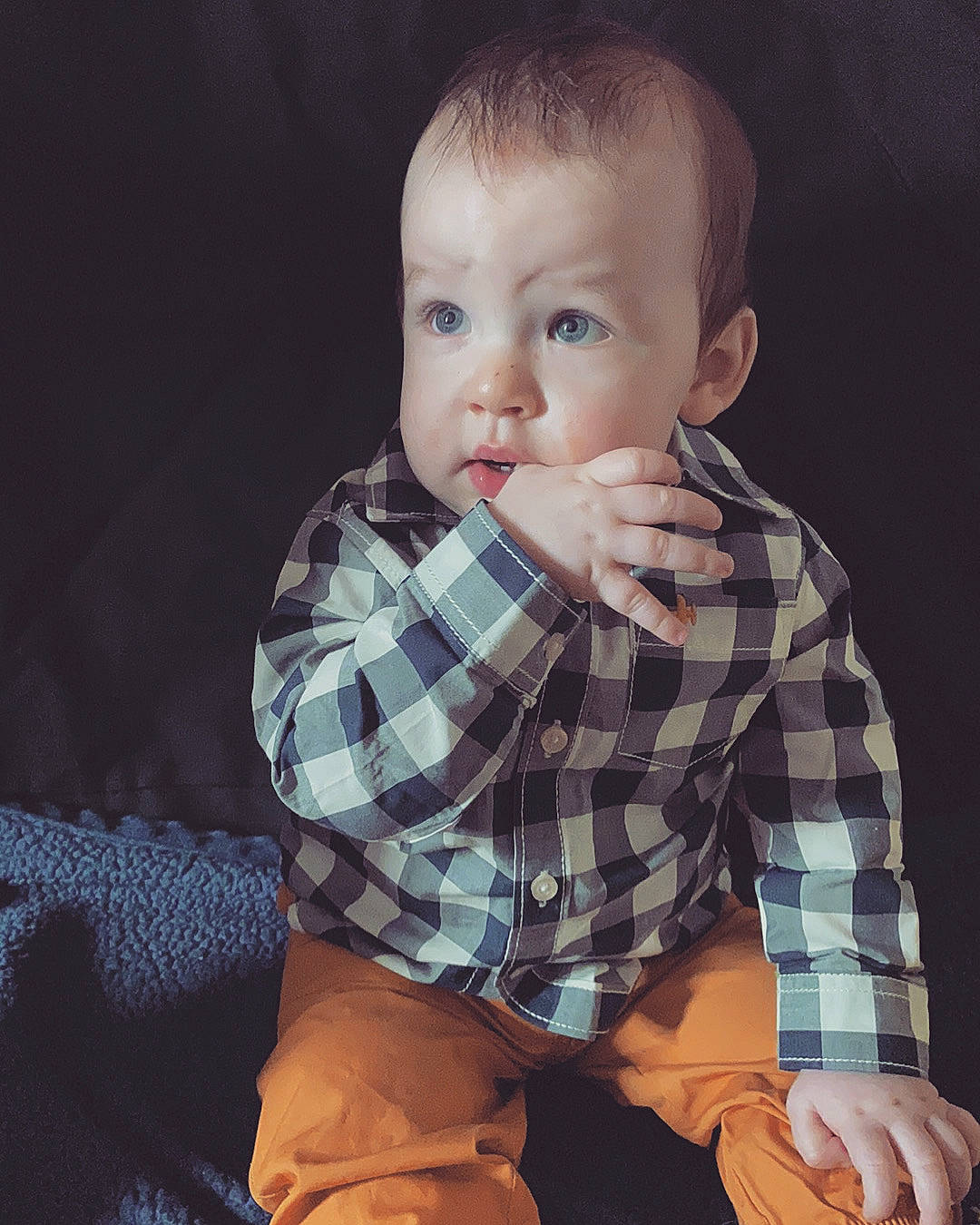 Malikai joined the competition — help win amazing prizes! arm, baby, cheek, child, chin, design, eye, face, finger, hand, head, human, lip, nose, pattern, person, plaid, sitting, skin, sleeve