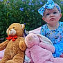 baby, child, tutu, headband, blue_clothing, pink_blanket, teddy_bear, stuffed_animal, plush_bunny, outdoor, garden, flowers, greenery, grass, cute, sitting, portrait, infant, toy, playtime