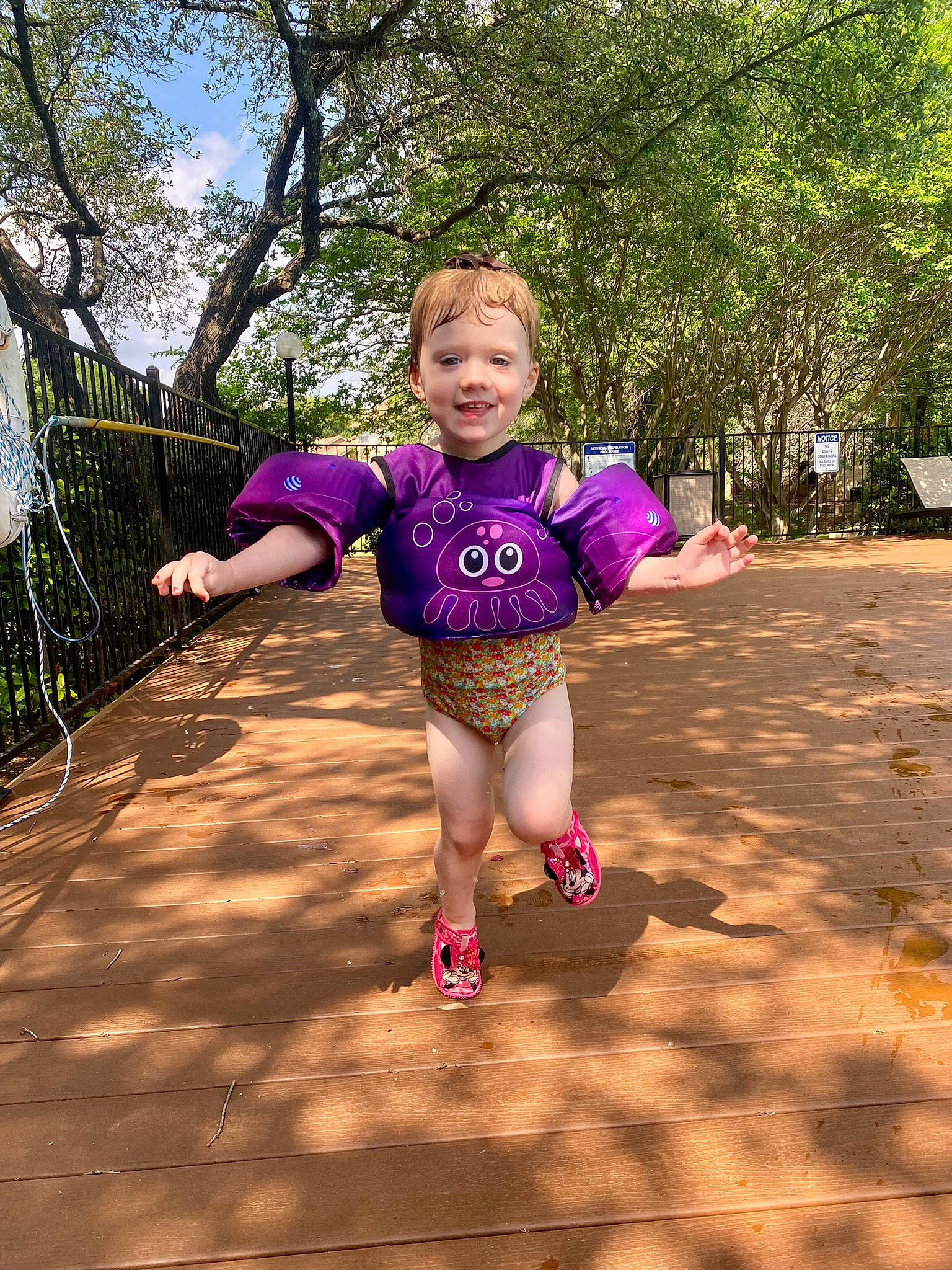 Olive is registered to the contest to win money with this photo: baby, baby_toddler_clothing, city, electric_blue, fun, grass, happy, joy, leisure, magenta, people_in_nature, person, pink, plant, recreation, sky, sleeve, smile, swing, thigh