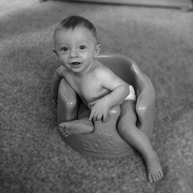 Boston joined the competition — help win amazing prizes! barechested, barefoot, chest, elbow, eye, flash_photography, foot, fun, grass, hair, happy, head, human_body, human_leg, monochrome, monochrome_photography, person, smile, thigh, toddler
