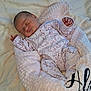 Alma participe au concours pour gagner de l'argent avec cette photo : baby, bed, blanket, cartoon_print, clothing, comfort, cozy, cute, fabric, indoors, infant, nest, newborn, onesie, peaceful, person, plush, resting, sleeping, soft