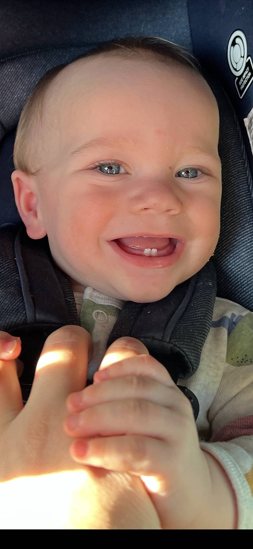 Macen is registered to the contest to win money with this photo: baby, baby_carriage, baby_toddler_clothing, cheek, chin, comfort, eyebrow, finger, gesture, hand, happy, joy, lip, mouth, nail, nose, person, skin, smile, thumb