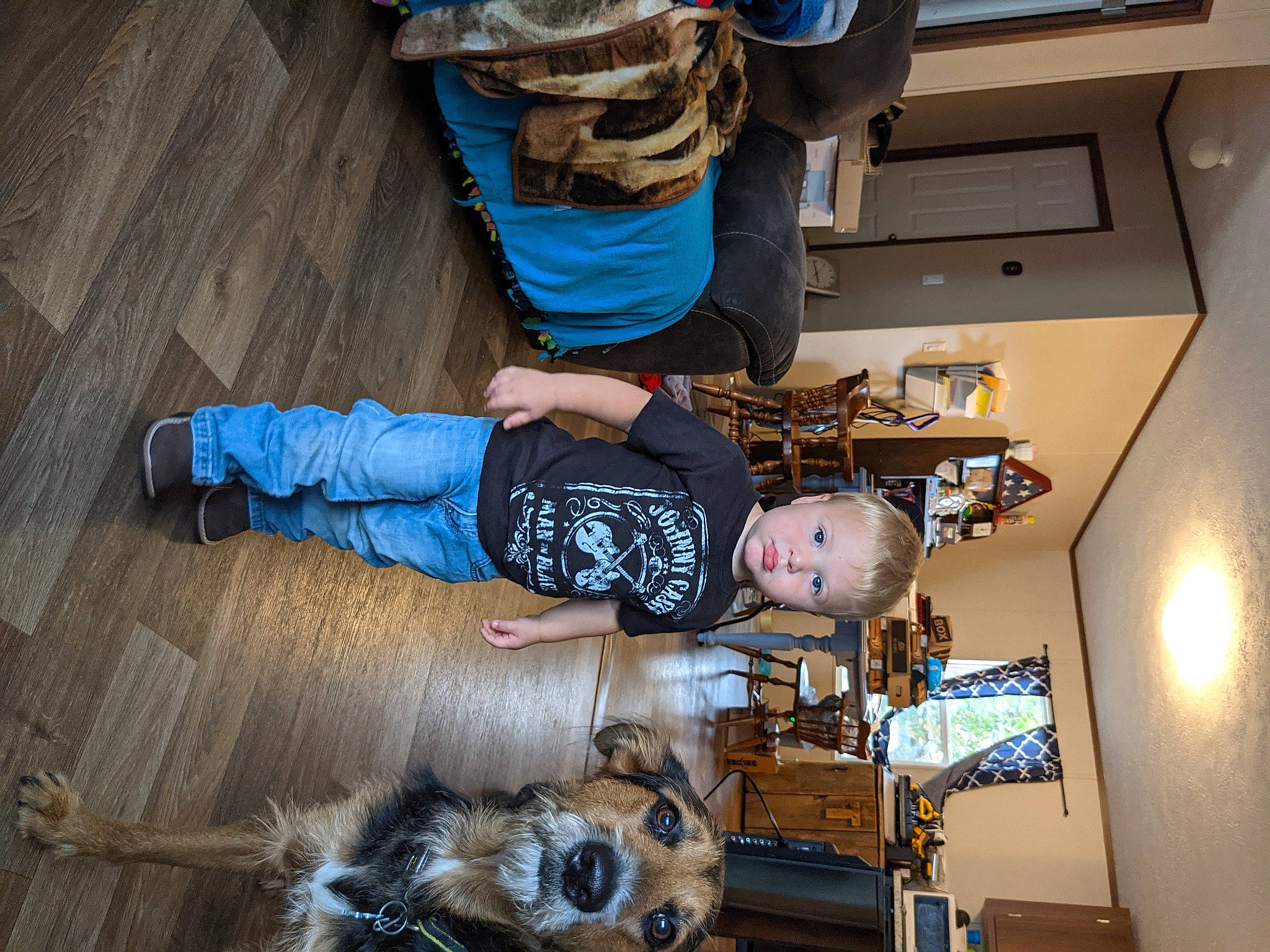 Lawrence is registered to the contest to win money with this photo: building, child, floor, flooring, fun, hardwood, hat, house, machine, person, room, t_shirt, toddler, walking_shoe, wood, wood_flooring