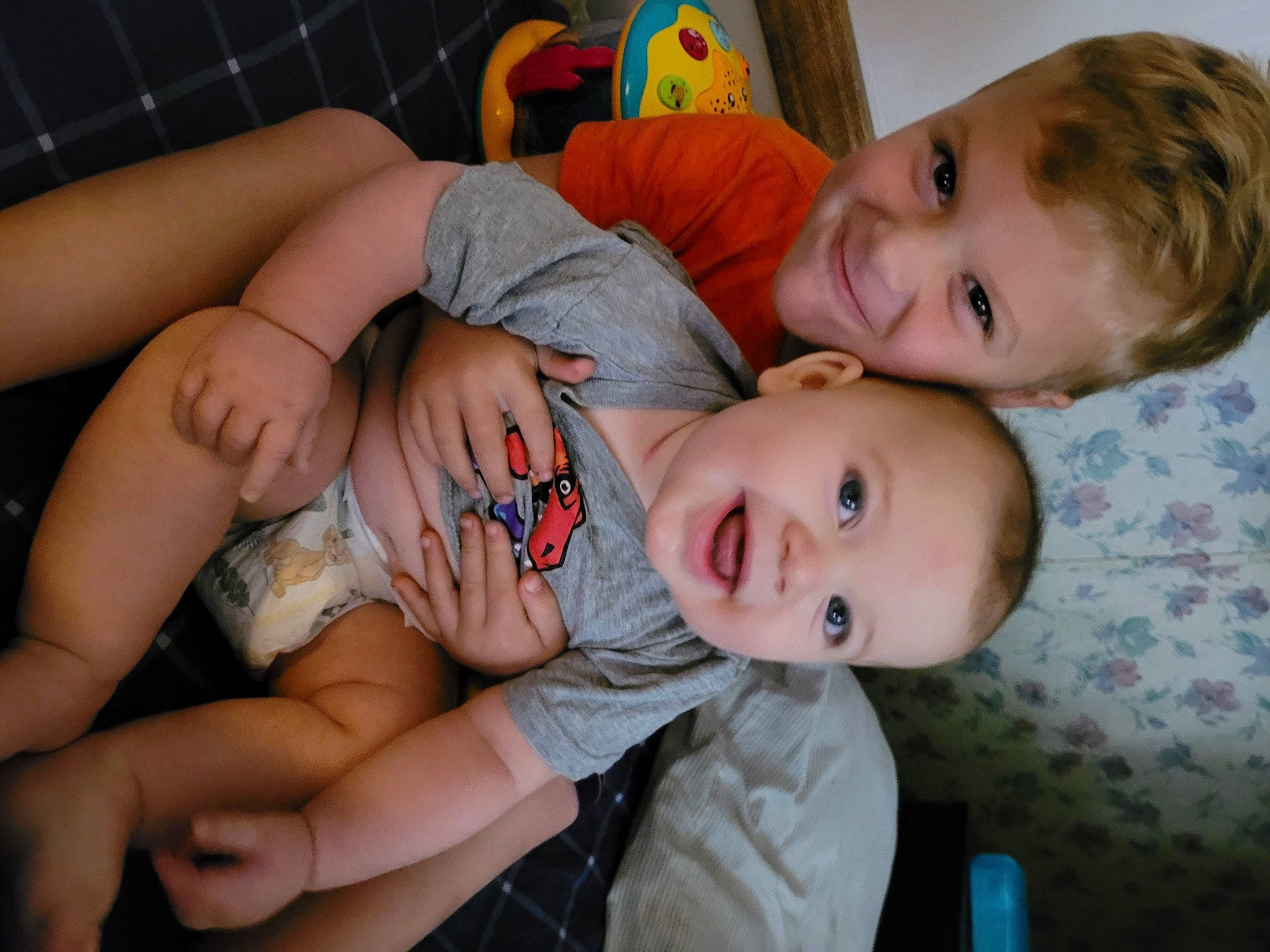 River is registered to the contest to win money with this photo: baby, baby_toddler_clothing, cheek, child, comfort, eye, face, finger, fun, hair, happy, head, human_body, iris, joy, mouth, nose, person, skin, smile