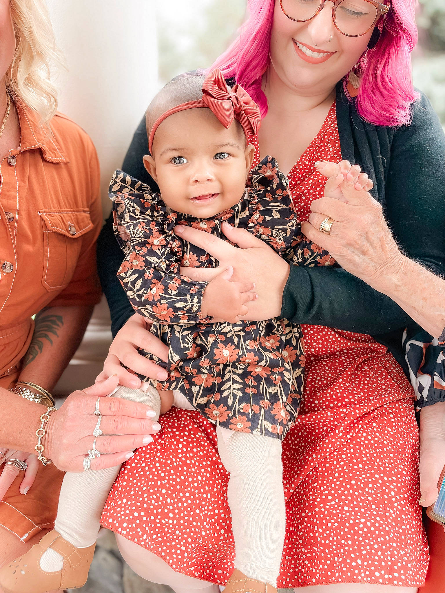 Celeste is registered to the contest to win money with this photo: baby_toddler_clothing, child, clothing, facial_expression, fashion, finger, friendship, gesture, happy, interaction, joy, person, photograph, pink, red, skin, smile, textile, thigh, toddler