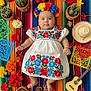 Ailaney joined the competition — help win amazing prizes! baby, infant, colorful_blanket, flower_crown, embroidered_dress, cactus, paper_flowers, sombrero, miniature_guitar, traditional_clothing, mexican_culture, portrait, closeup, laying_down, cute, festive, decorations, handmade, celebration, child