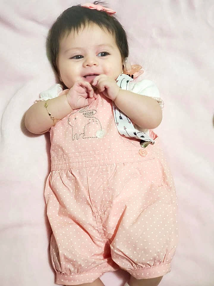 Elaine joined the competition — help win amazing prizes! baby, baby_toddler_clothing, beauty, cheek, child, eye, facial_expression, finger, gesture, hand, happy, mouth, nose, person, pink, product, skin, sleeve, smile, standing