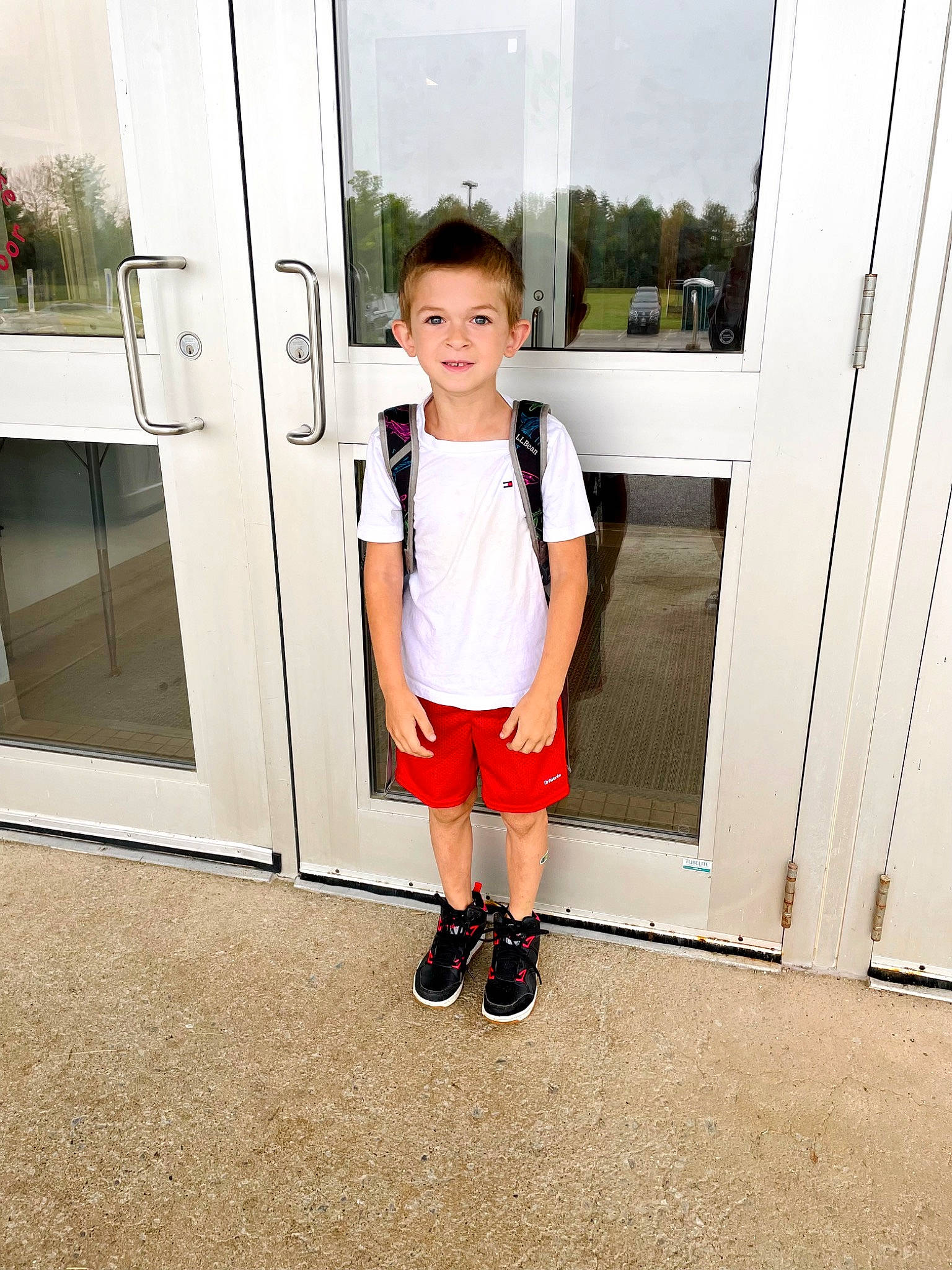 Maxwell joined the competition — help win amazing prizes! baby_toddler_clothing, door, electric_blue, fashion_design, flooring, footwear, happy, human_leg, joy, knee, leg, leisure, pattern, person, plant, shorts, sleeve, standing, thigh, toddler