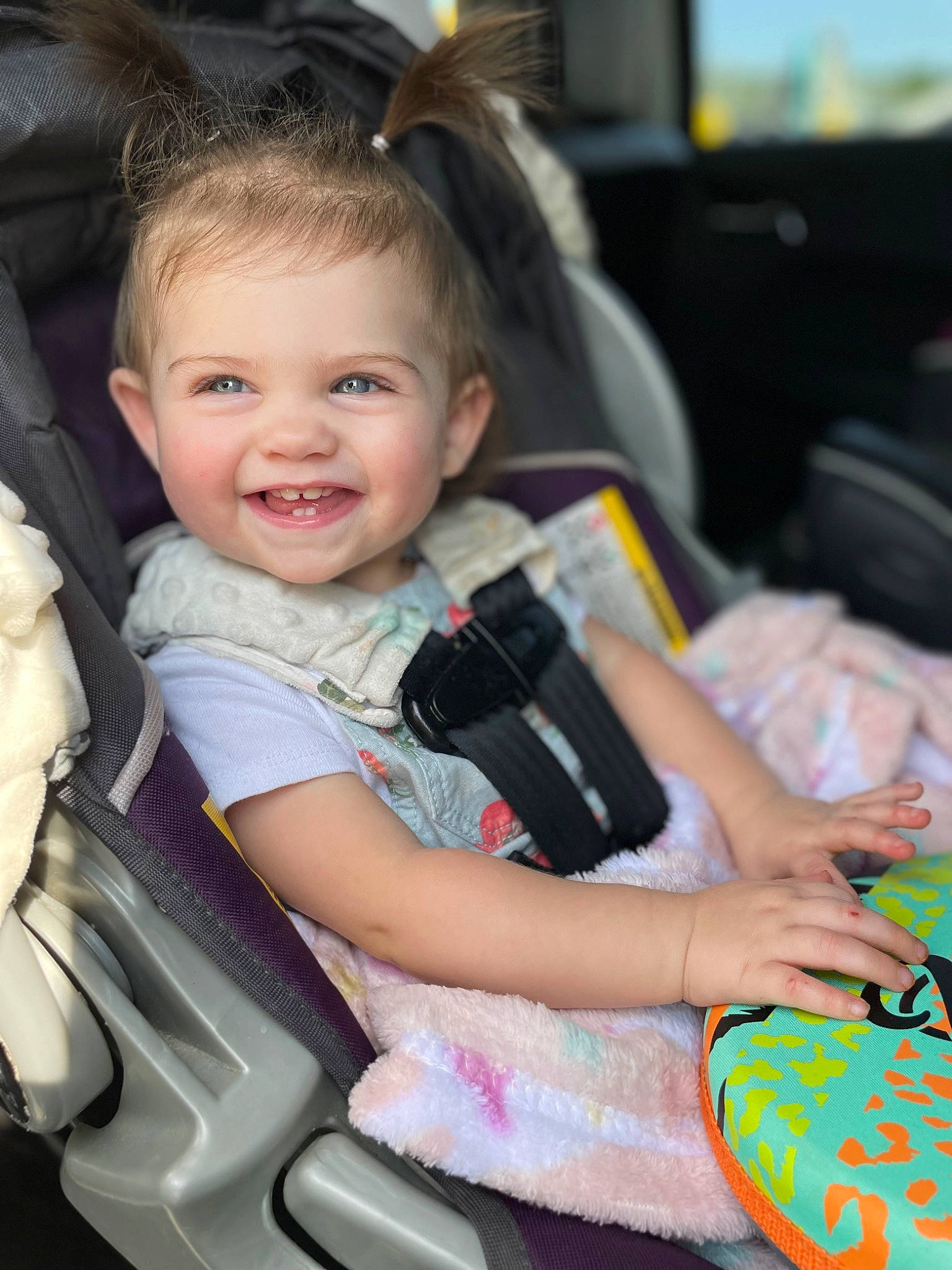 Reign Elizabeth is registered to the contest to win money with this photo: auto_part, automotive_design, baby, baby_carriage, baby_products, baby_toddler_clothing, car_seat, child, comfort, event, fun, hairstyle, happy, joy, lap, leisure, people, person, sitting, skin