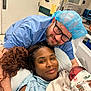 Alpha is registered to the contest to win money with this photo: newborn, baby, hospital, mother, father, family, bed, medical, healthcare, patient, blanket, hospital_gown, iv_line, smile, love, together, care, happy, indoors, people