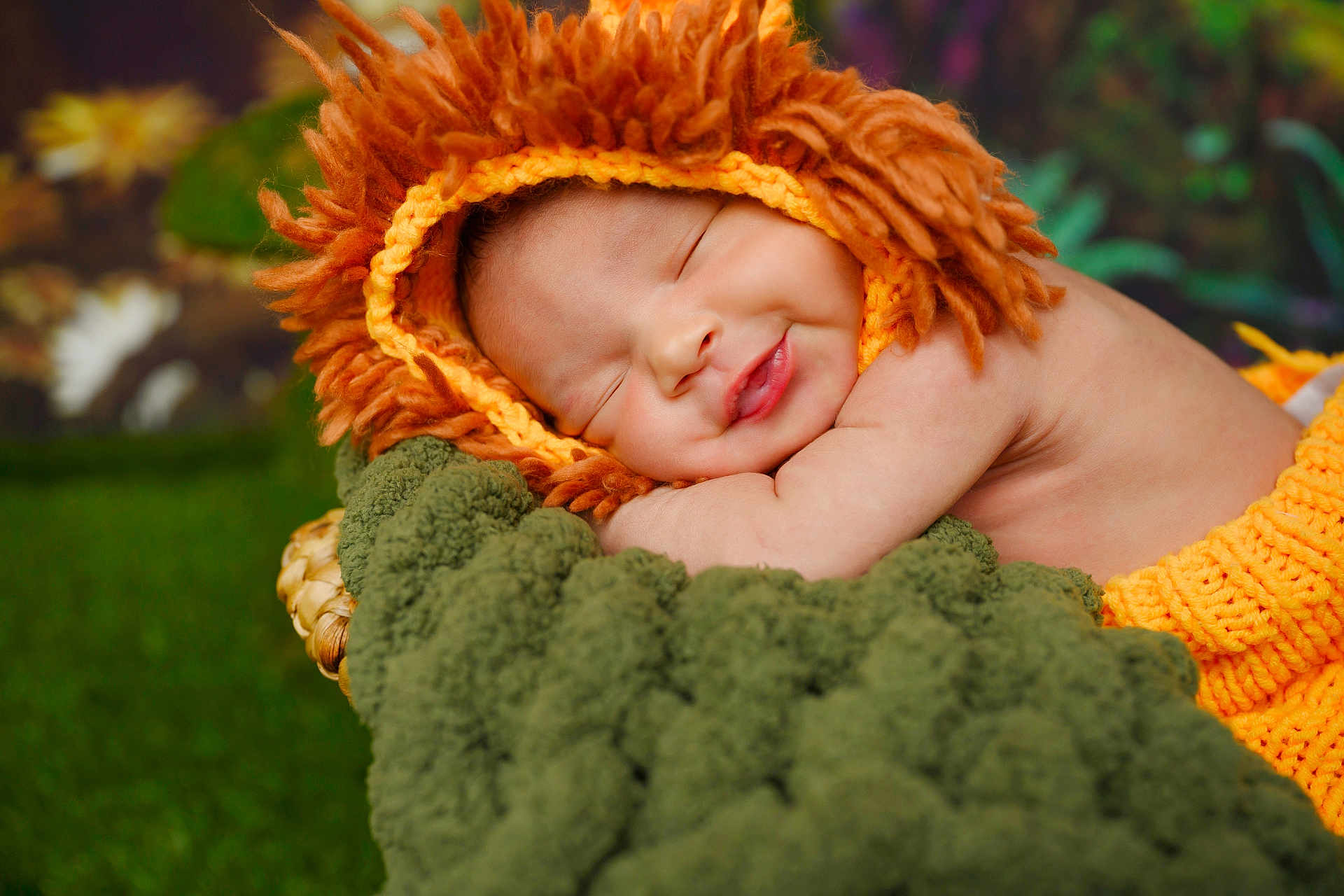 Alpha joined the competition — help win amazing prizes! baby, infant, smile, sleeping, knitted_hat, lion_costume, orange, green_blanket, soft_texture, portrait, cute, resting, child, cozy, warm, outdoor, nature, peaceful, adorable, closeup