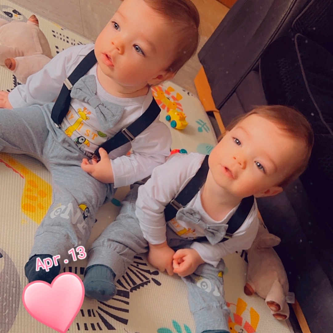 Archie And Reggie is registered to the contest to win money with this photo: accessories, baby, clothing, couch, cushion, face, footwear, furniture, head, homedecor, hosiery, jeans, pants, person, photography, portrait, shoe, sitting, sock, toy