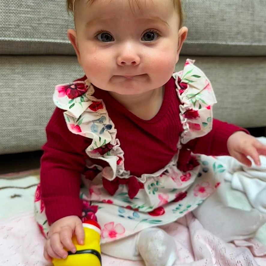 Ivy joined the competition — help win amazing prizes! baby, bodypart, clothing, coat, couch, cutlery, face, finger, furniture, hand, happy, head, indoors, interiordesign, jacket, person, photography, portrait, sitting, spoon