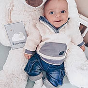 Tiago participe au concours pour gagner de l'argent avec cette photo : baby, infant, teddy_bear, plush_toy, milestone_card, 2_months_old, clothing, fleece_jacket, denim_pants, socks, smiling, face, cute, child, indoor, soft_toy, white, blue, cozy, portrait