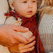 Alaina joined the competition — help win amazing prizes! adult, baby, bow, child, closeup, cute, fall, family, hands, headband, holding, knitwear, outdoor, person, portrait, red_clothing, sweater, toddler, warm_lighting, young_child