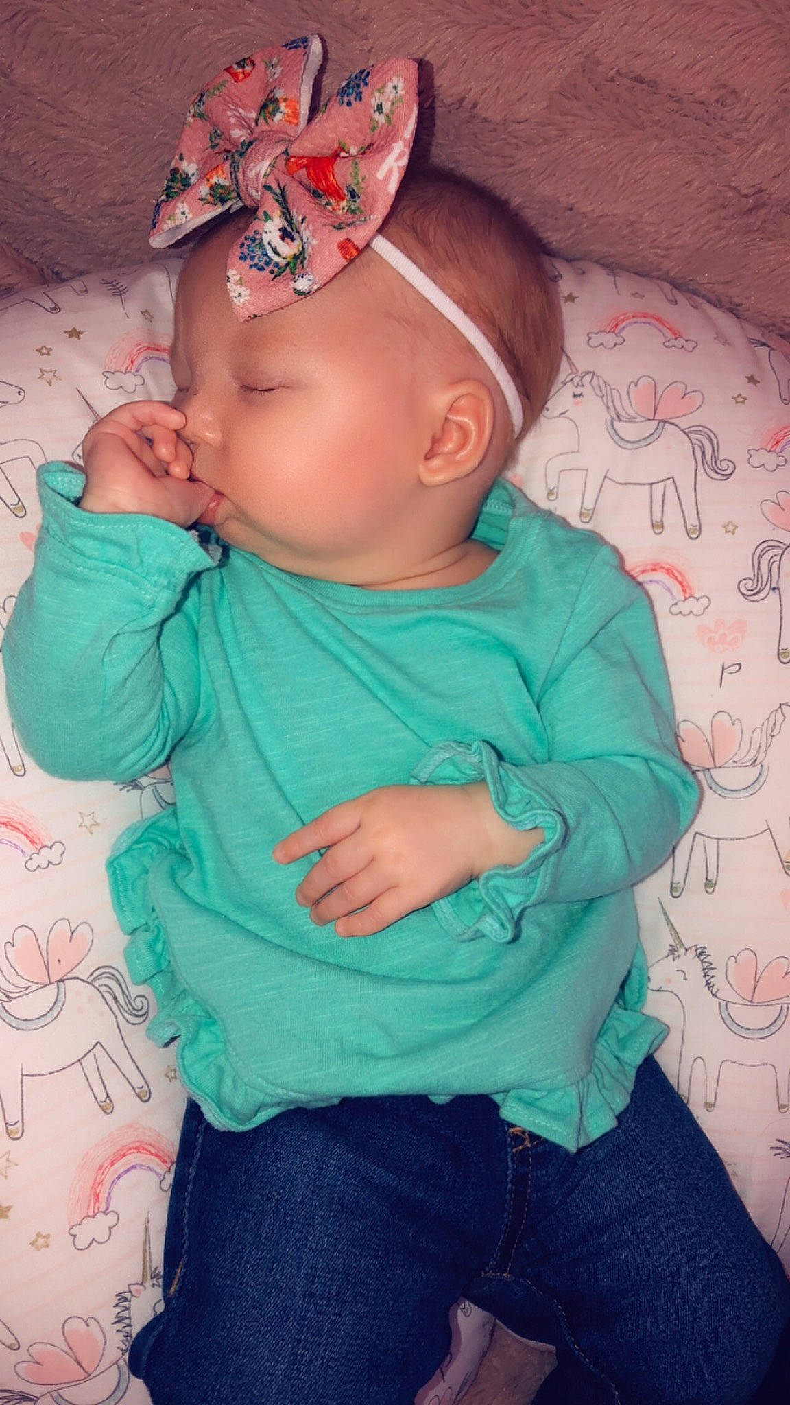 Finley is registered to the contest to win money with this photo: arm, baby, baby_toddler_clothing, blue, cap, eye, face, hand, happy, head, headgear, jeans, mouth, neck, organ, person, pink, skin, sleeve, textile