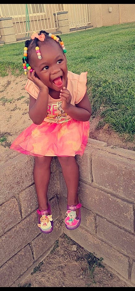 Royal is registered to the contest to win money with this photo: baby_toddler_clothing, beauty, face, fun, grass, happy, leg, leisure, lip, magenta, people_in_nature, person, pink, plant, red, sandal, shoe, skin, summer, thigh