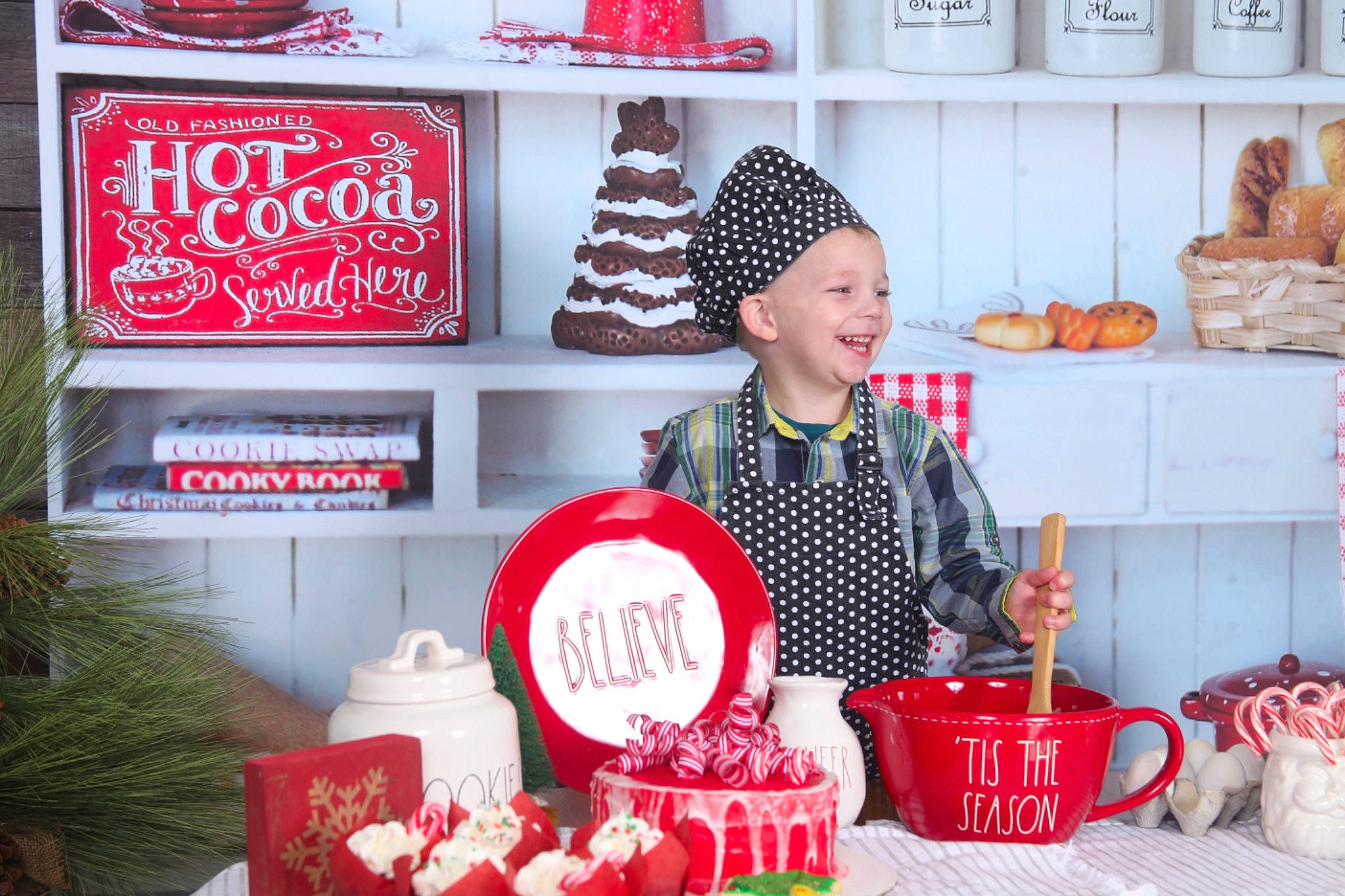 Malachi joined the competition — help win amazing prizes! baked_goods, baking, beanie, cake, cake_decorating, christmas, cooking, costume_accessory, cream, cuisine, dessert, fruit, headwear, holiday, icing, ingredient, joy, party_supply, person, retail