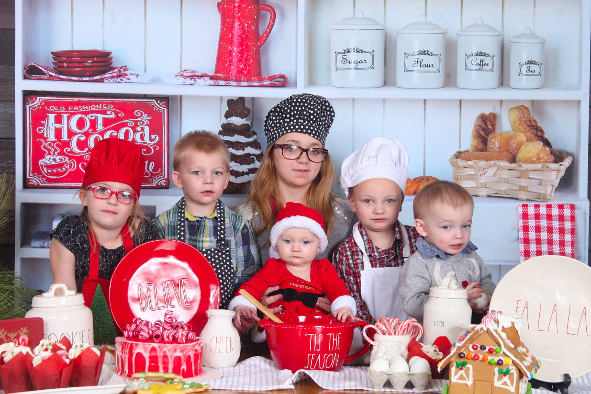 Malachi is registered to the contest to win money with this photo: baked_goods, beanie, bonnet, box, child, collection, costume_accessory, cuisine, dessert, dish, family, headwear, holiday, knit_cap, meal, nose, peach, person, porcelain, produce