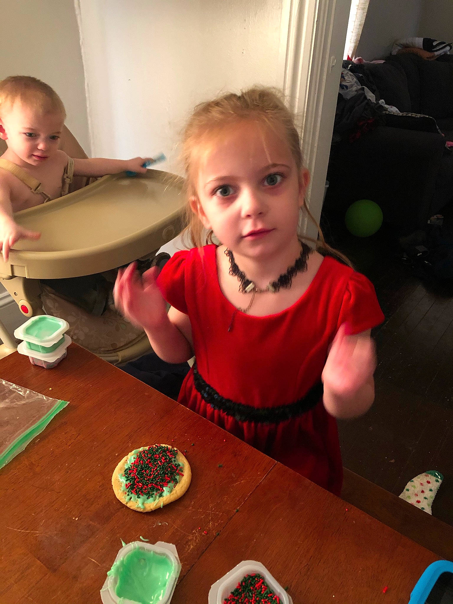 Briella joined the competition — help win amazing prizes! baked_goods, cake, cake_decorating, child, chocolate, cuisine, dessert, dish, dress, ear, face, food, head, ingredient, mouth, nose, person, plate, sweetness, tableware