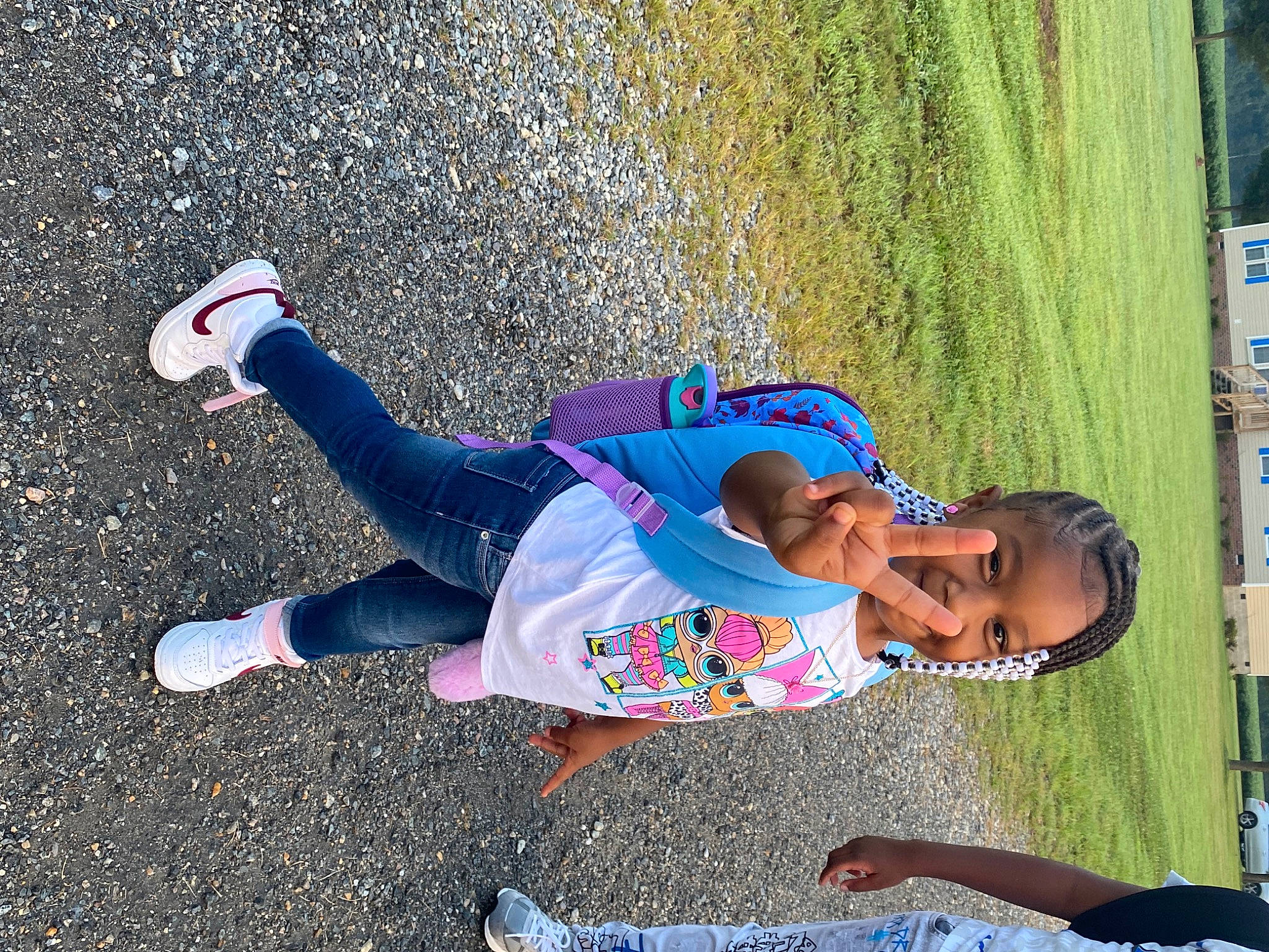Amirah is registered to the contest to win money with this photo: asphalt, child, electric_blue, footwear, fun, grass, happy, knee, leisure, people_in_nature, person, play, public_space, recreation, shoe, sidewalk, sneakers, sunglasses, toddler, walking_shoe
