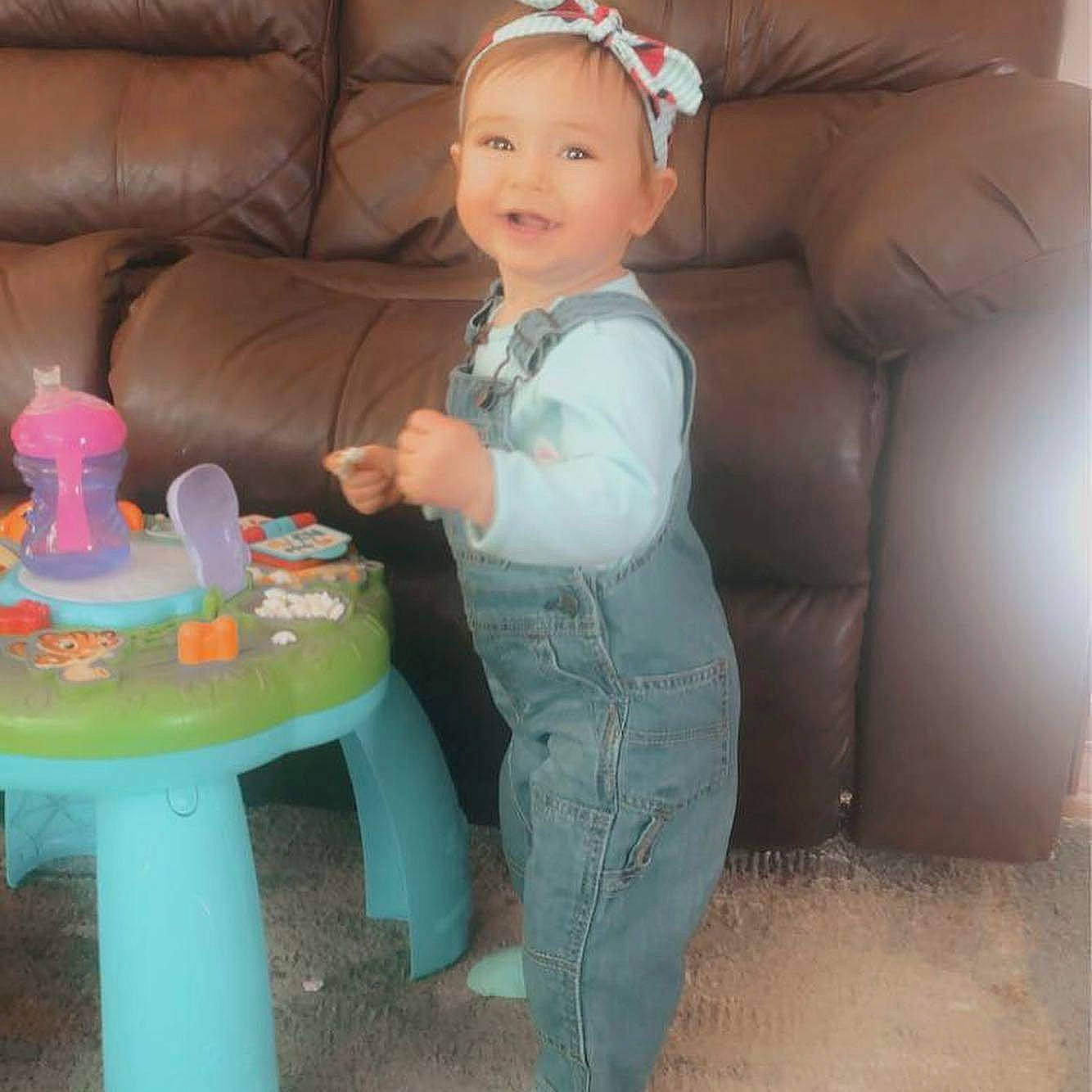 Carter joined the competition — help win amazing prizes! baby, baby_toddler_clothing, costume_accessory, costume_hat, couch, dessert, furniture, hair_accessory, headband, headpiece, joy, living_room, party_supply, person, pink, plastic, stool, toddler