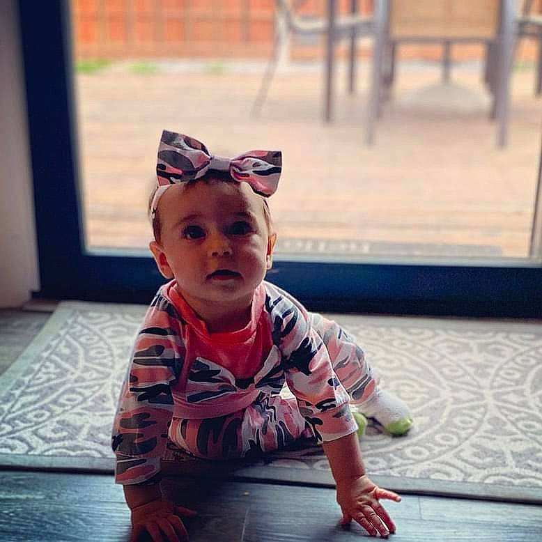 Carter is registered to the contest to win money with this photo: baby, baby_crawling, baby_toddler_clothing, cheek, child, child_model, crawling, curious, floor, flooring, foot, goggles, person, sunglasses, toddler, tummy_time, wood_flooring