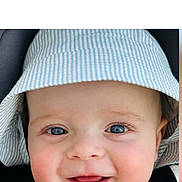 Marceau a rejoint le concours — aidez-le/la à gagner de superbes lots ! baby, child, face, smiling, hat, blue_eyes, close_up, portrait, cute, infant, headwear, happy, cheeks, skin, person, clothing, seatbelt, car_seat, baby_face, young_child