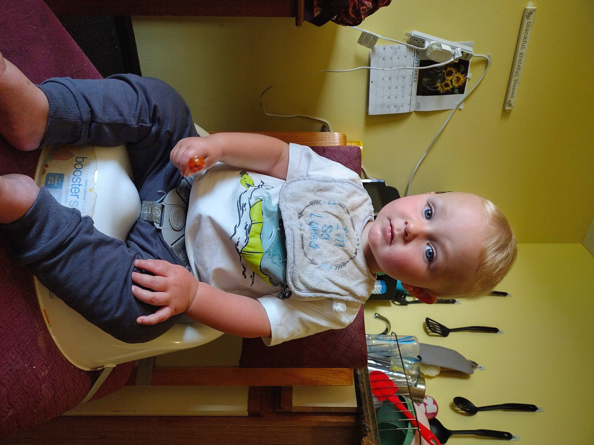 Bailey is registered to the contest to win money with this photo: baby, child, comfort, elbow, finger, fun, hat, health_care, human_leg, knee, leg, medical_procedure, person, play, room, service, sitting, thigh, thumb, toddler