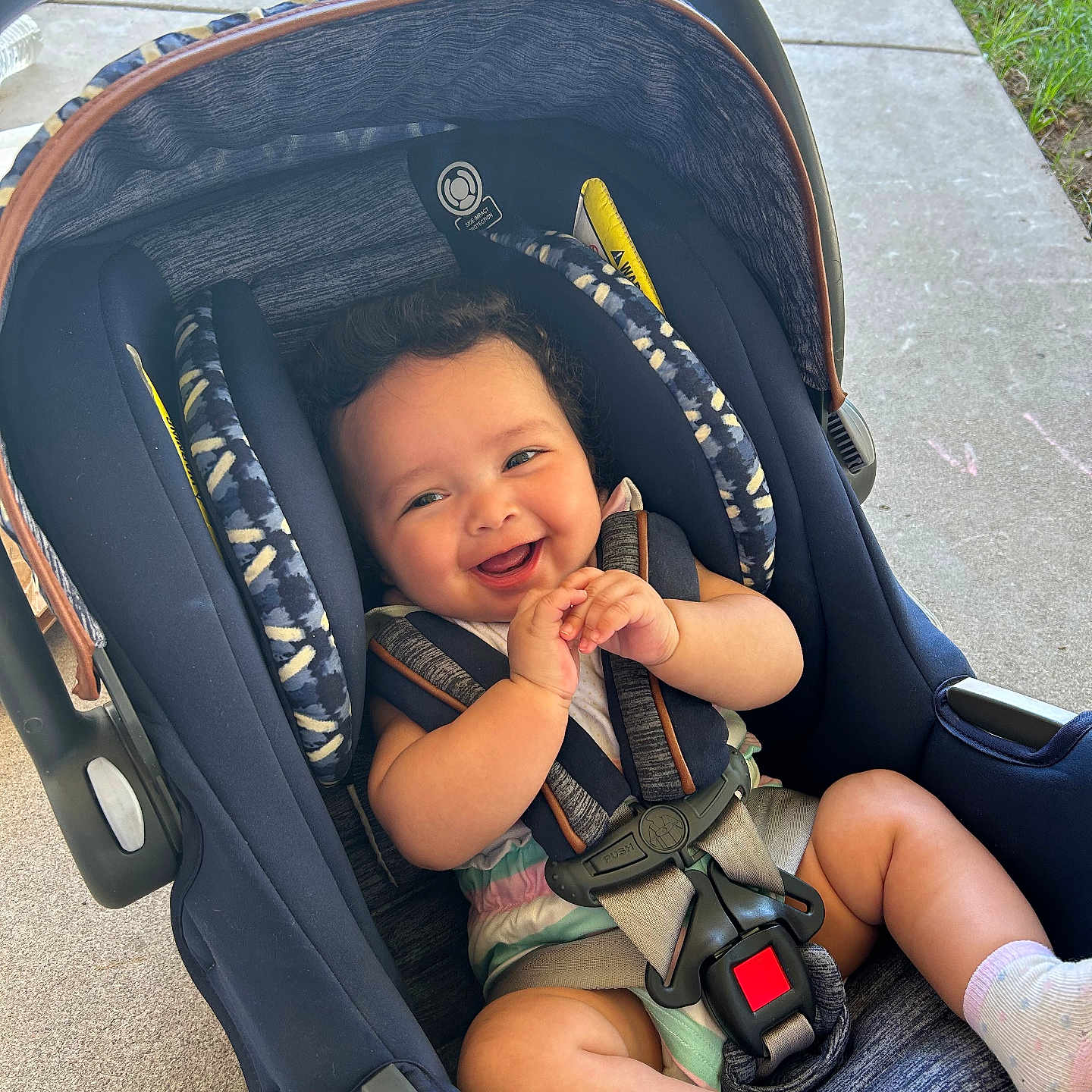 Audrina joined the competition — help win amazing prizes! baby, car, city, clothing, face, footwear, grass, happy, head, hosiery, pants, person, photography, plant, portrait, shoe, sock, stroller, transportation, vehicle
