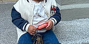 Denim joined the competition — help win amazing prizes! child, clothing, coat, face, female, footwear, girl, happy, head, jacket, jeans, pants, person, photography, portrait, rock, shoe, sitting, smile, sneaker