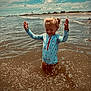 Willow joined the competition — help win amazing prizes! child, toddler, water, splash, beach, ocean, sky, clouds, sunny, playing, summer, happy, outdoor, vacation, waves, shore, blue_sky, small_child, joy, fun