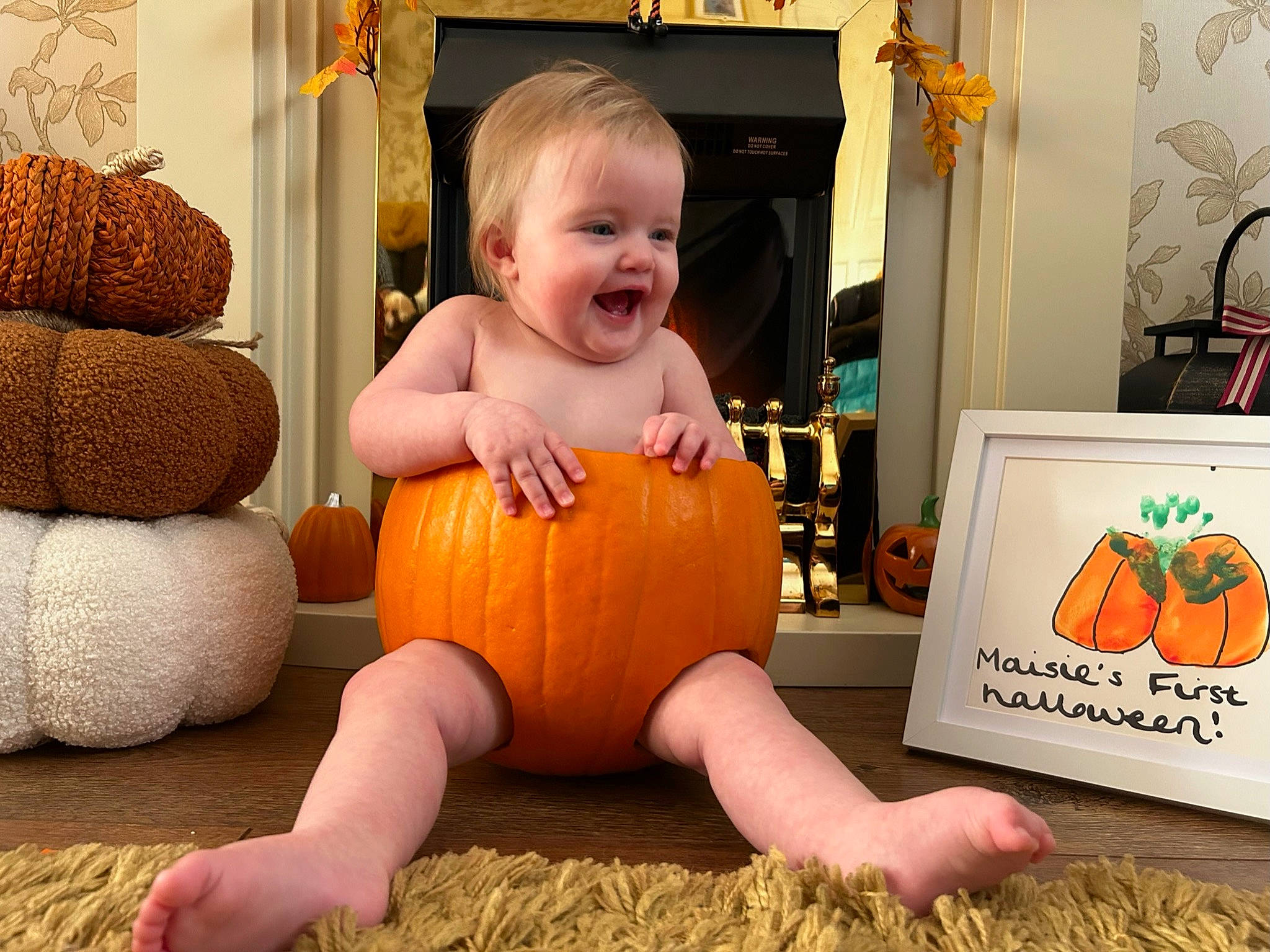 Maisie joined the competition — help win amazing prizes! baby, baby_toddler_clothing, calabaza, child, cucurbita, flooring, gourd, happy, local_food, natural_foods, orange, person, plant, pumpkin, room, smile, squash, toddler, vegetable, winter_squash