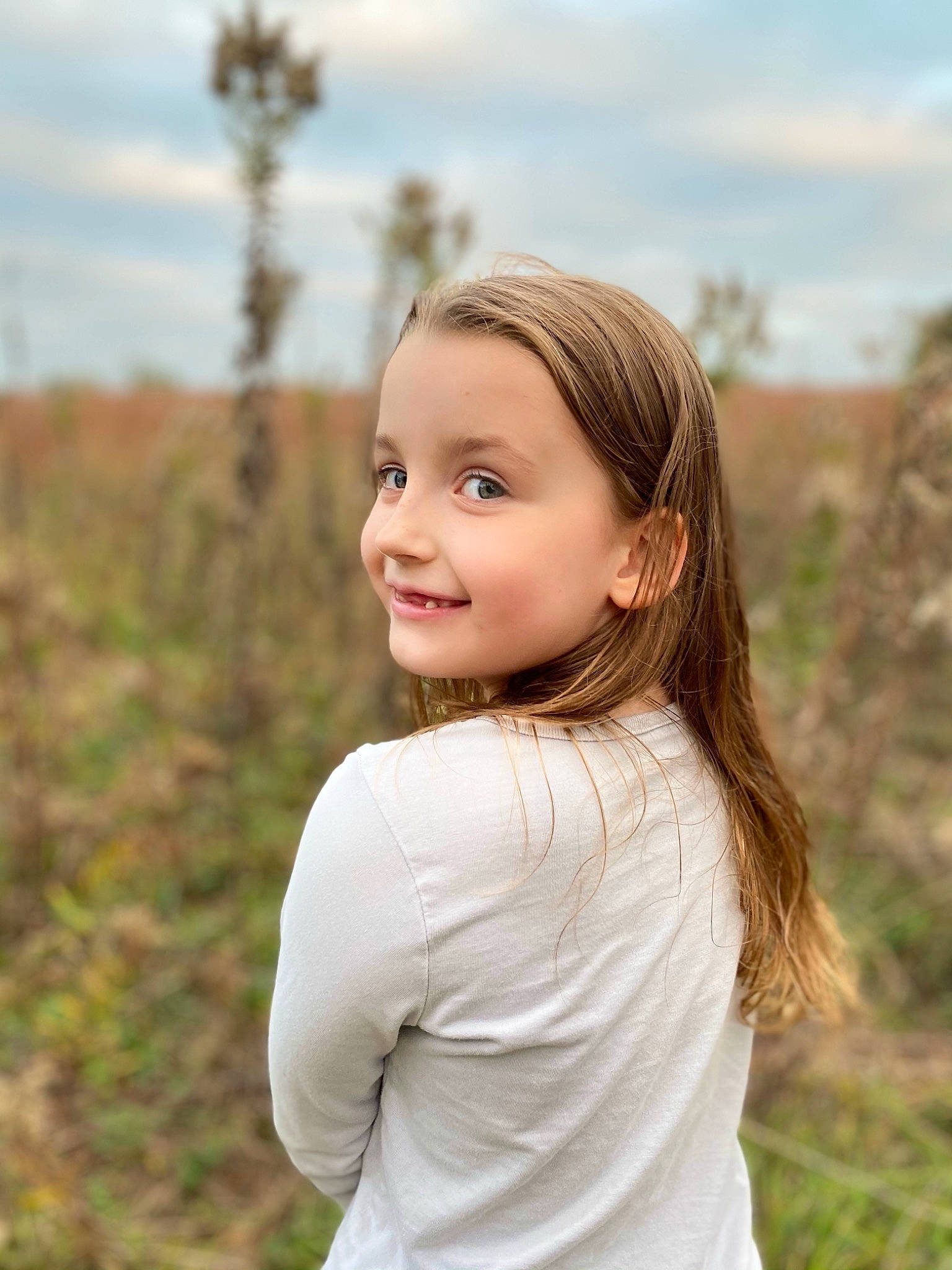 Elliott joined the competition — help win amazing prizes! chin, cloud, eye, eyebrow, face, flash_photography, grass, grass_family, grassland, happy, iris, joy, lip, long_hair, meadow, people_in_nature, person, plant, sky, smile