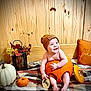 Memphis joined the competition — help win amazing prizes! baby, pumpkin, beanie, smile, plaid_blanket, autumn, milestone_card, orange, wooden_wall, decor, fall, cute, infant, sitting, cozy, face, child, blanket, holiday, seasonal