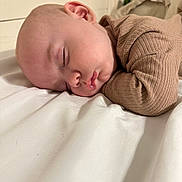 Memphis is registered to the contest to win money with this photo: baby, sleeping, face, infant, child, skin, clothing, bed, blanket, cute, peaceful, rest, young, head, ear, mouth, nose, pale, soft, indoors